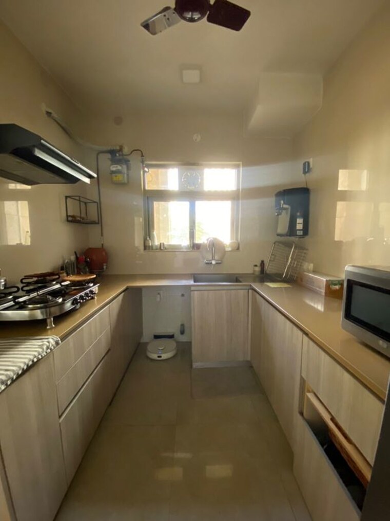 Kitchen, hiranandani-estate-rodas-enclave 2 Bedroom 727 Sq.Ft. Apartment In Ghodbunder Road Thane 10679380