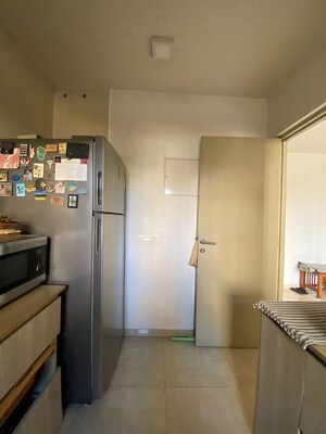 Kitchen in 2 BHK Apartment at Hiranandani Estate Rodas Enclave, Ghodbunder Road – for Sale