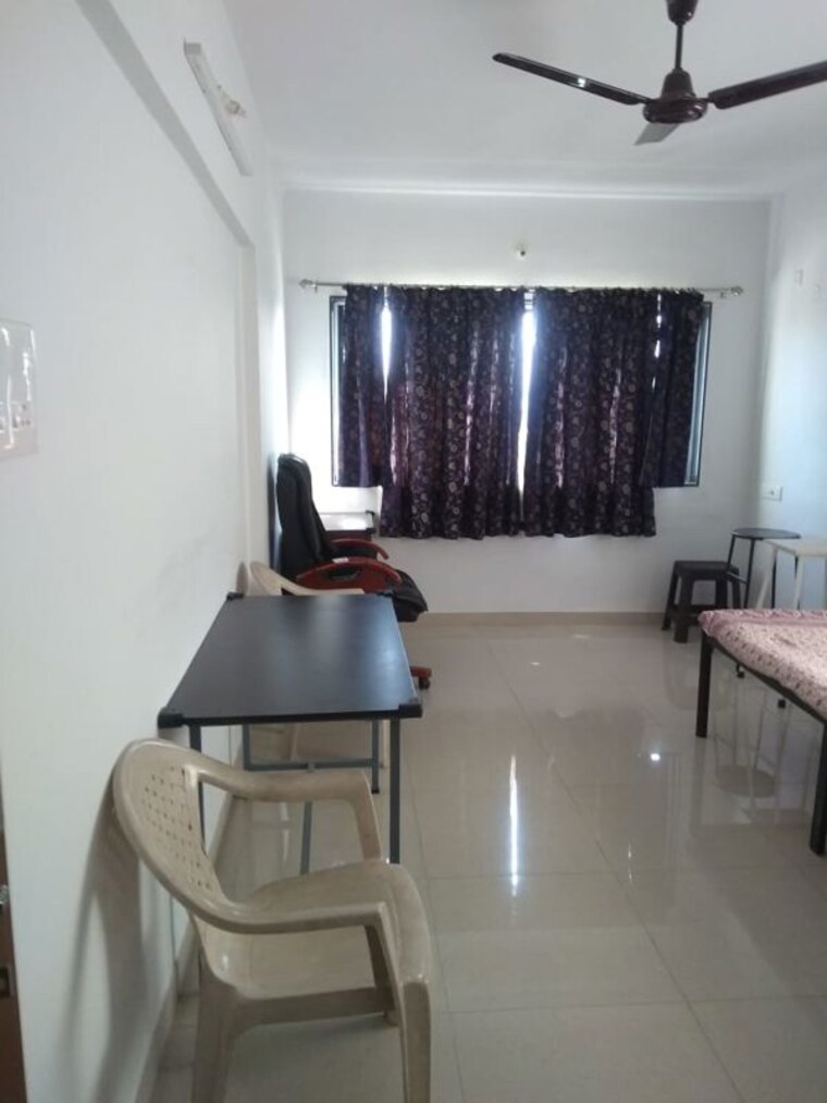 Living Room, kumar-mahatma-society 1 Bedroom 650 Sq.Ft. Apartment In Kothrud Pune 10679499