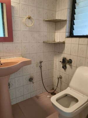 Bathroom in 3 BHK Apartment at Lokhandwala Whispering Palms, Kandivali East – for Sale