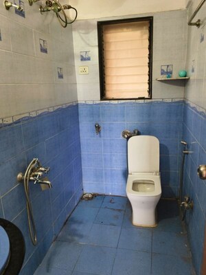 Bathroom in 3 BHK Apartment at Lokhandwala Whispering Palms, Kandivali East – for Sale