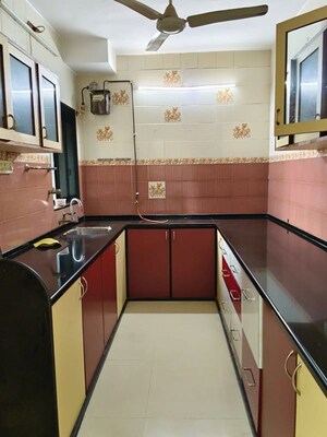 Kitchen in 3 BHK Apartment at Lokhandwala Whispering Palms, Kandivali East – for Sale