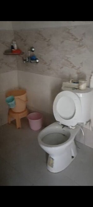 Bathroom in 2 BHK Apartment at Charms Castle, Raj Nagar Extension – for Sale
