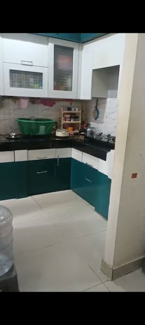 Kitchen in 2 BHK Apartment at Charms Castle, Raj Nagar Extension – for Sale