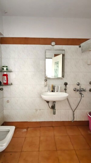 Bathroom in 3 BHK Apartment at Dheeraj Valley, Goregaon East – for Rent