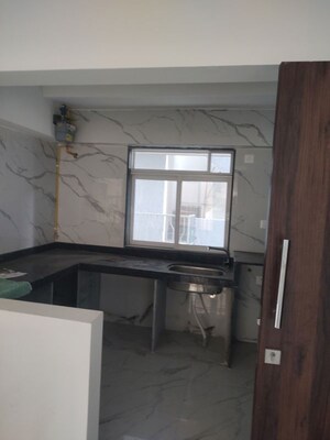 Kitchen in 2 BHK Apartment at Vraj Gateway Aparna CHS, Borivali West – for Rent
