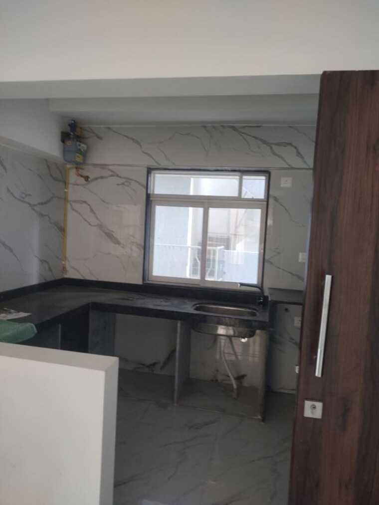 Kitchen, vraj-gateway-aparna-chs 2 Bedroom 517 Sq.Ft. Apartment In Borivali West Mumbai 10679578