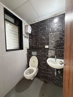 Bathroom in 1 BHK Apartment at Runwal Gardens Phase I, Dombivli East – for Rent
