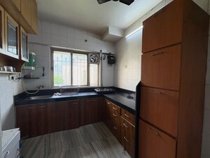 Kitchen in 2 BHK Apartment at Nexus Hyde Park Residency, Manpada – for Rent