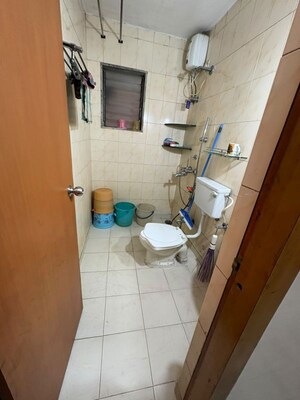 Bathroom in 2 BHK Apartment at Nexus Hyde Park Residency, Manpada – for Rent