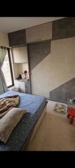 Bedroom in 2 BHK Apartment at Prakriti Towers, Goregaon East – for Rent