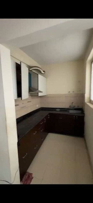 Kitchen in 2 BHK Apartment at Grah Avas Green View Heights, Raj Nagar Extension – for Rent