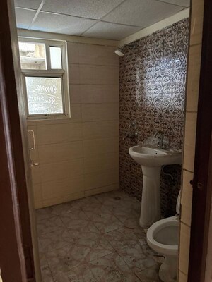 Bathroom in 2 BHK Apartment at Grah Avas Green View Heights, Raj Nagar Extension – for Rent