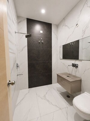 Bathroom in 5 BHK Apartment at Milton Tower, Vip Road – for Sale