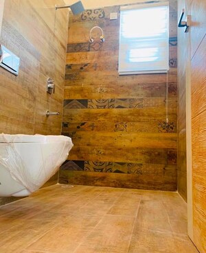 Bathroom in 5 BHK Apartment at Milton Tower, Vip Road – for Sale
