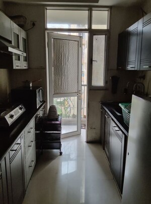 Kitchen in 3 BHK Apartment at Supertech Cape Town, Sector 74 – for Rent