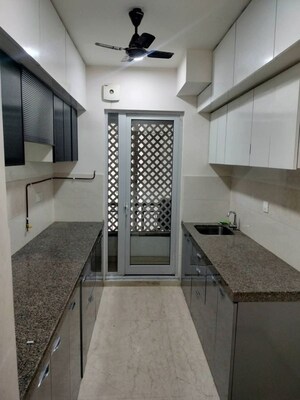 Kitchen in 2 BHK Apartment at Piramal Vaikunth, Balkum Pada – for Rent