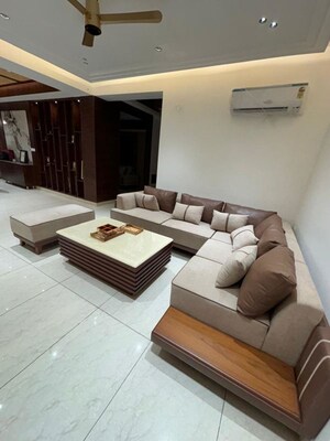 Living Room in 5 BHK Apartment at Homeland Global Park CP Atelier, Industrial Area – for Rent