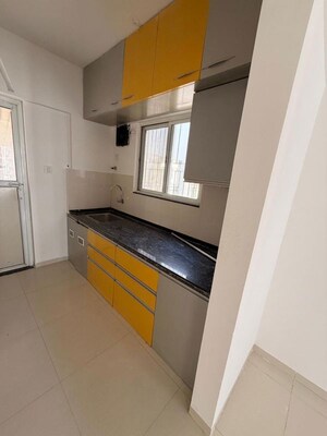 Kitchen in 2 BHK Apartment at Abhinav Pebbles Urbania, Bavdhan – for Sale