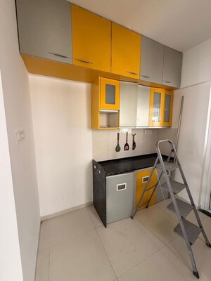 Kitchen in 2 BHK Apartment at Abhinav Pebbles Urbania, Bavdhan – for Sale