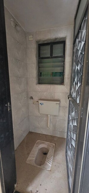 Bathroom in 1 BHK Apartment at Evershine Millenium Paradise, Kandivali East – for Rent