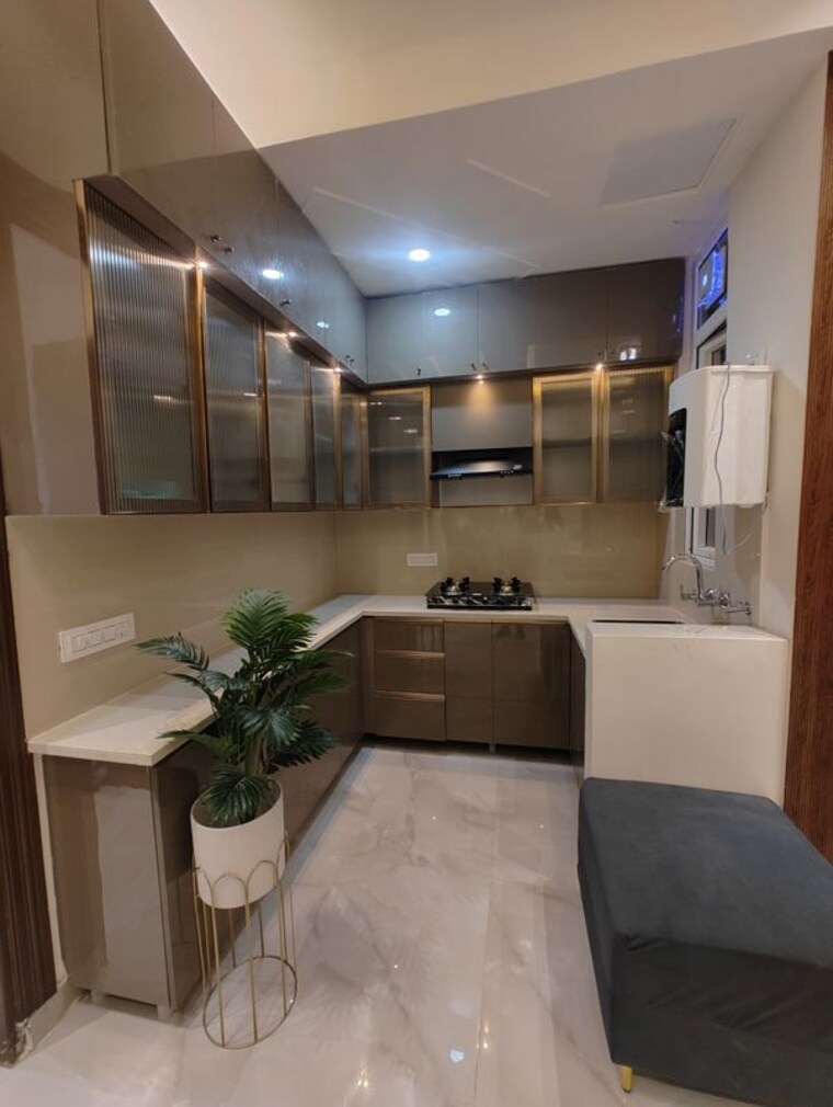 Kitchen, ambesten-twin-county 2 Bedroom 950 Sq.Ft. Apartment In Sector 1 Greater Noida Greater Noida 10679788