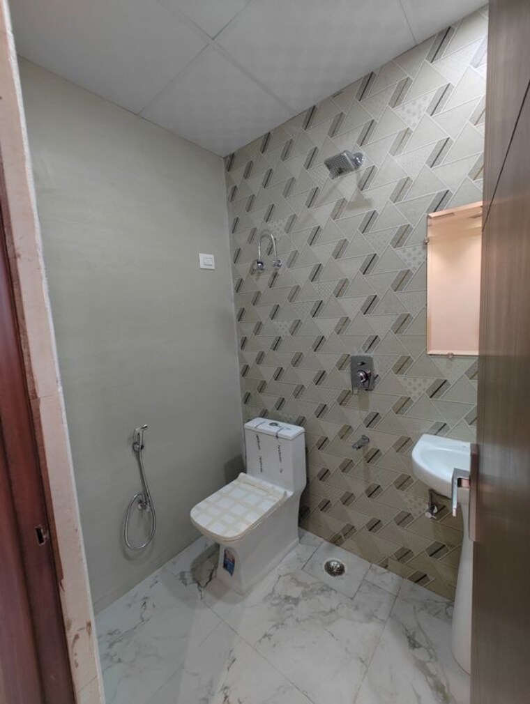 Bathroom, ambesten-twin-county 2 Bedroom 950 Sq.Ft. Apartment In Sector 1 Greater Noida Greater Noida 10679788