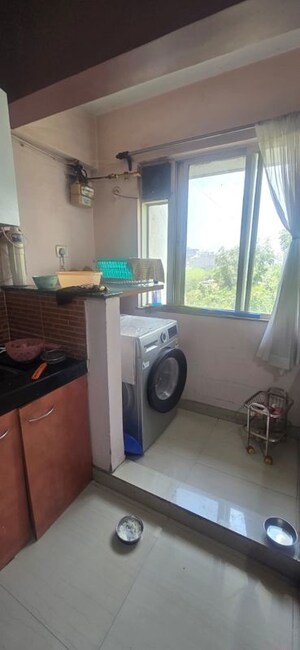 Kitchen in 3 BHK Apartment at Pimple Saudagar – for Sale