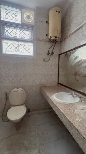 Bathroom in 3 BHK Builder Floor at Kalkaji – for Rent