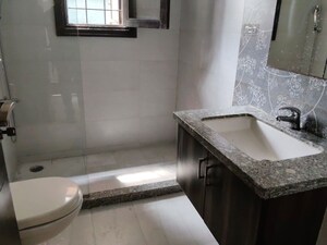 Bathroom in 4 BHK Builder Floor at Kailash Colony – for Rent