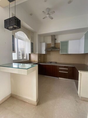 Kitchen in 3.5 BHK Apartment at Puri Diplomatic Greens Villas, Sector 111 – for Rent