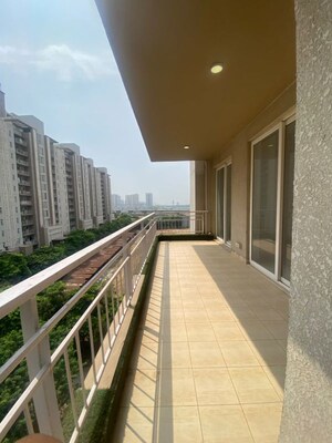 Balcony in 3.5 BHK Apartment at Puri Diplomatic Greens Villas, Sector 111 – for Rent