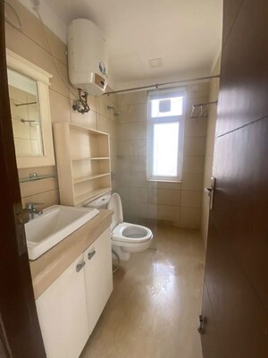 Bathroom in 3.5 BHK Apartment at Puri Diplomatic Greens Villas, Sector 111 – for Rent