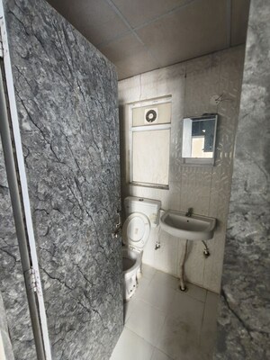 Bathroom in 2 BHK Apartment at Pivotal Riddhi Siddhi, Sector 99 – for Rent