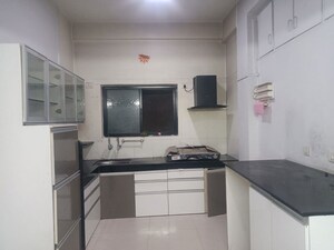 Kitchen in 2 BHK Apartment at Senapati Bapat Road – for Rent