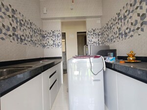 Kitchen in 1 BHK Apartment at Raunak Bliss, Ghodbunder Road – for Rent