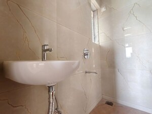 Bathroom in 1 BHK Apartment at Raunak Bliss, Ghodbunder Road – for Rent