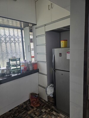 Kitchen in 2 BHK Apartment at Rajas CHS, Andheri East – for Sale