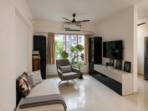 Living Room in 1 BHK Apartment at Buildarch Wisteria, Dadar West – for Rent