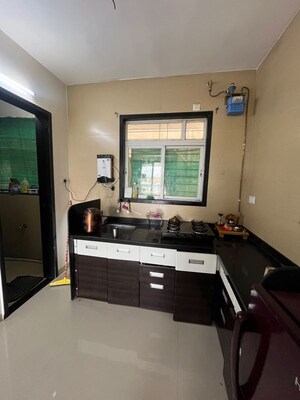 Kitchen in 2 BHK Apartment at Chintamani Residency Bhusari, Bhusari Colony – for Rent