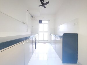 Kitchen in 2 BHK Apartment at Godrej Emerald, Ghodbunder Road – for Rent