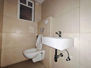 Bathroom in 3 BHK Apartment at Godrej Emerald, Ghodbunder Road – for Rent