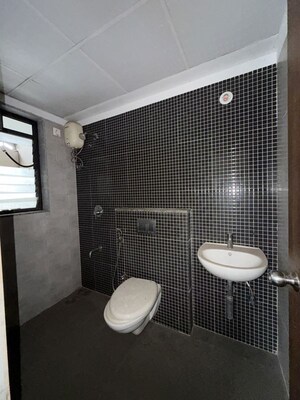 Bathroom in 2 BHK Apartment at Lodha Downtown, Dombivli East – for Rent