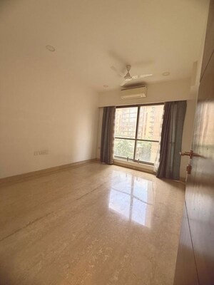Room in 2 BHK Apartment at Rustomjee Paramount, Khar West – for Rent