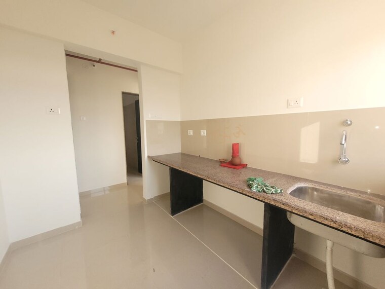 Kitchen, puranik-city-reserva 2 Bedroom 717 Sq.Ft. Apartment In Ghodbunder Road Thane 10680155