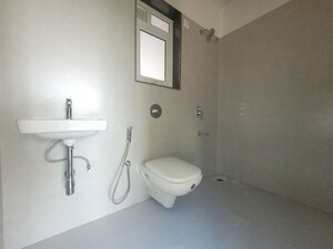 Bathroom in 2 BHK Apartment at Puranik City Reserva, Ghodbunder Road – for Rent
