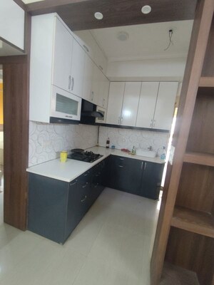 Kitchen in 2 BHK Apartment at Paramount Floraville, Sector 137 – for Sale