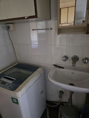 Kitchen in 2 BHK Apartment at Rajas CHS, Andheri East – for Sale
