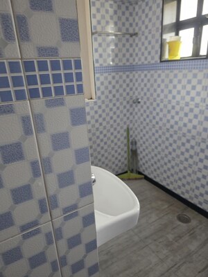 Bathroom in 2 BHK Apartment at Rajas CHS, Andheri East – for Sale