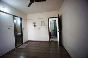 Room in 2 BHK Apartment at Charholi Budruk – for Sale